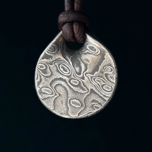 Damascus PENDANT. Forged in Montana. Unique. Layered Steel. Rugged. Leather cord. Necklace. Gifts. For him. For her. Jewelry. Best seller