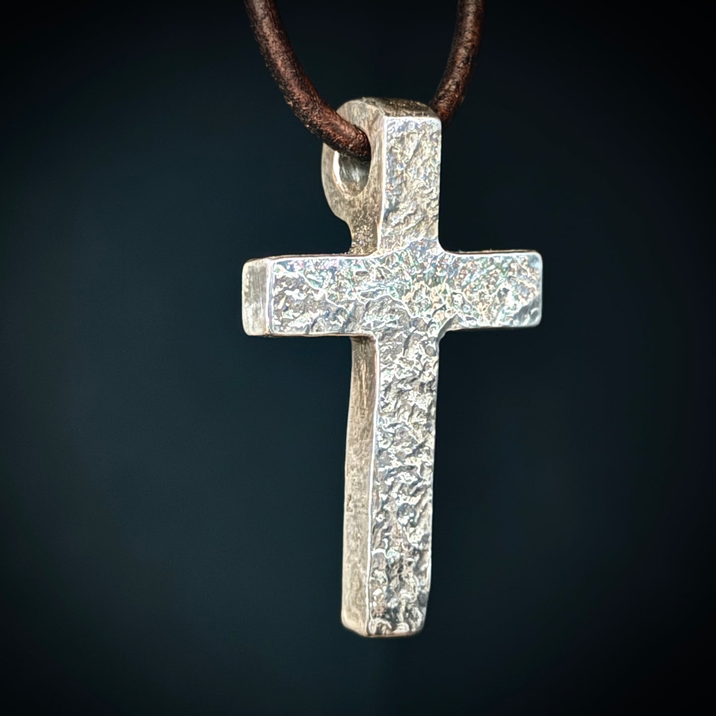 999+ Pure Silver Polished Textured Cross Pendant. Made in America. Hand forged in Montana