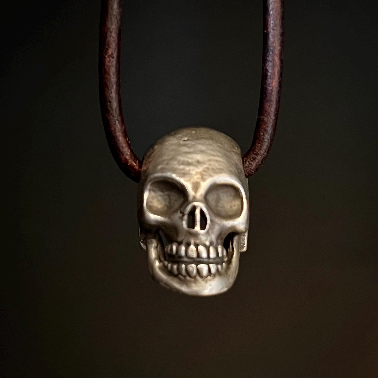 999+ Pure Silver Skull Pendant. Made in America. hand forged in Montana.